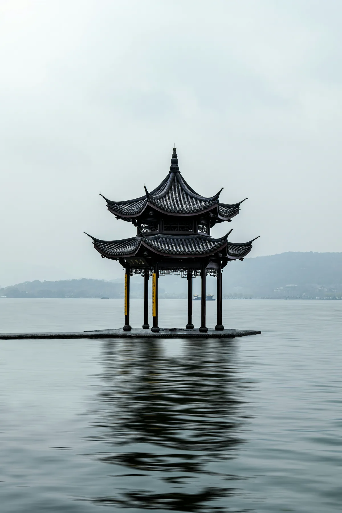 A misted lakeside pavilion from the Hangzhou city record